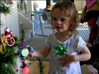 Peo holding Cookie Monster Ornament