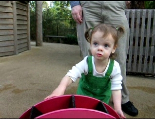 Peo turning a water wheel.