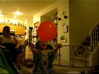 Peo catching a balloon.