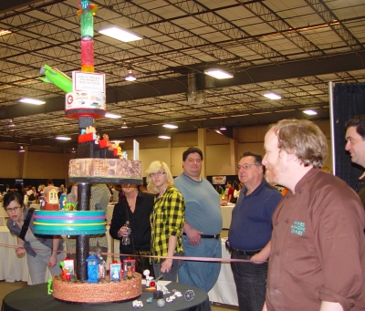 Mike McCarey looking at the Space by Spacewest cake
