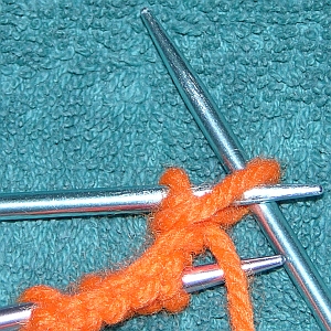 Knitting with Double-Pointed Needles Step 12