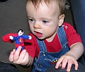 Baby Playing with Superman