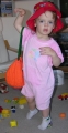 Child Playing with Pumpkin Bag - View 2