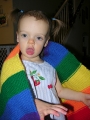 Baby Playing with Rainbow Scarf